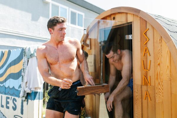 man getting out of a Mobile Sauna rental