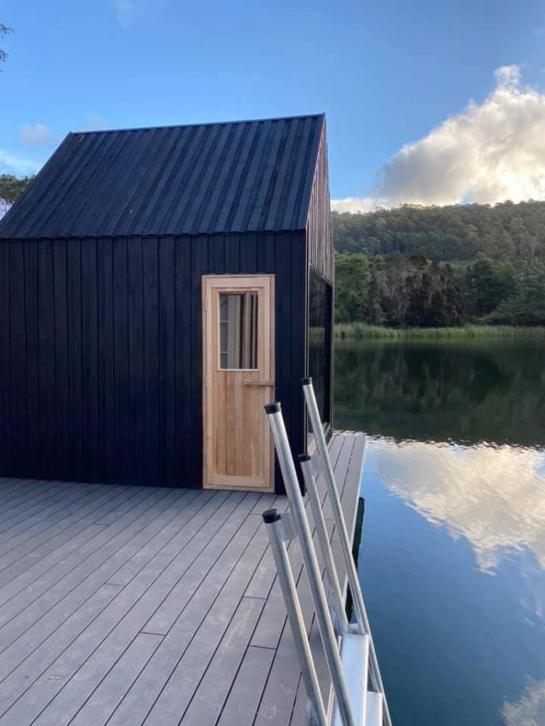 black sauna by the lake